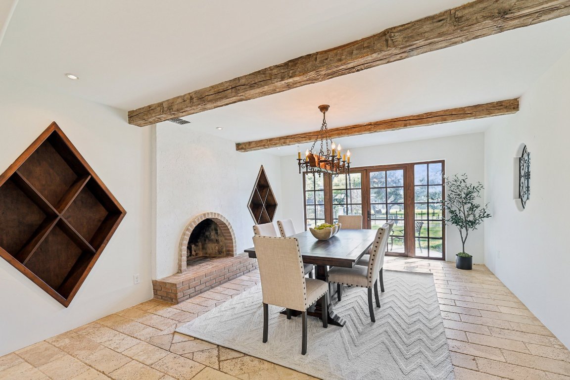 2706 Pearce Road Austin, TX 78730 - Photo 13 of 38 A spacious dining zone ready for both casual meals and formal dinner parties.