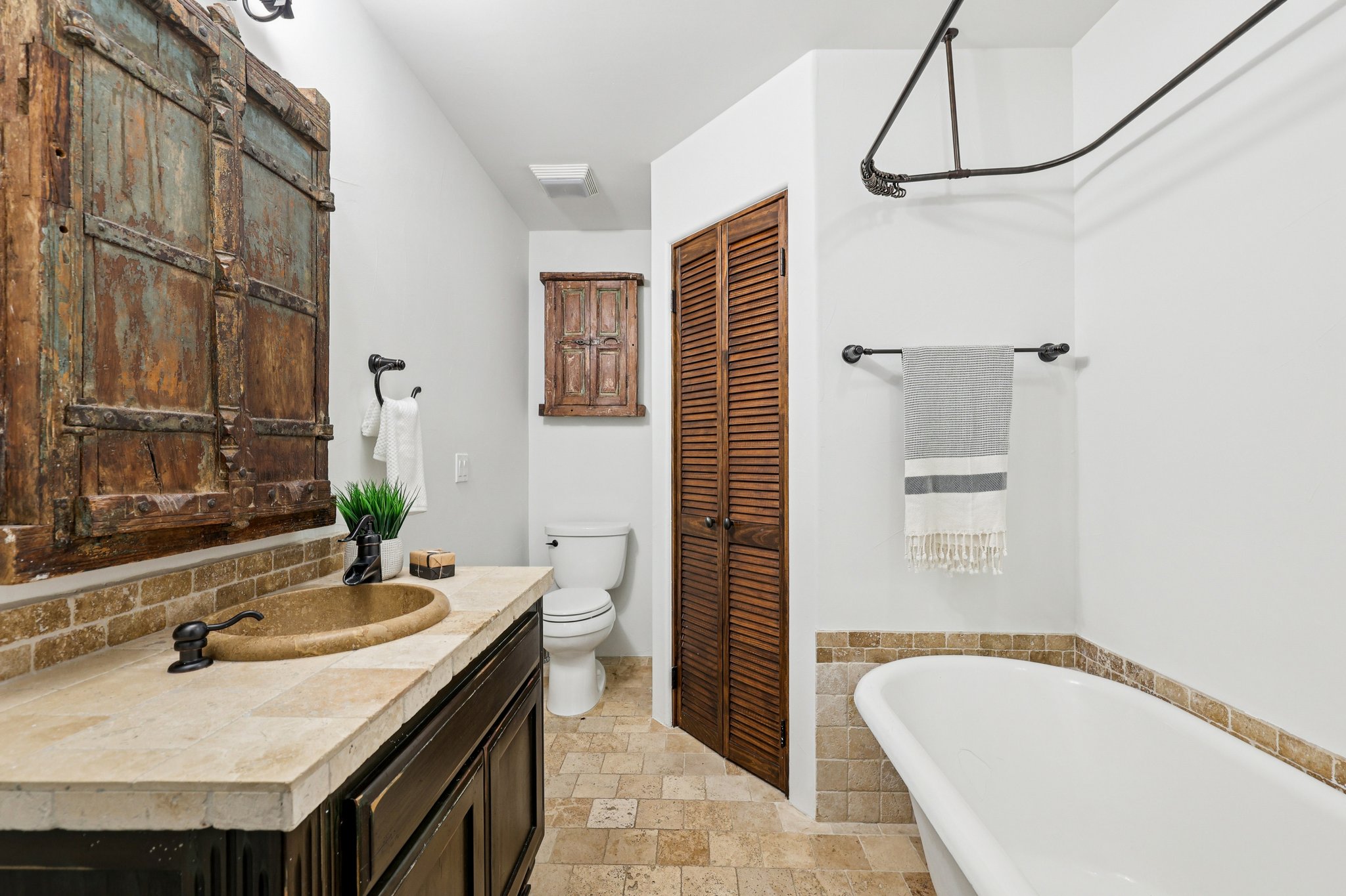 2706 Pearce Road Austin, TX 78730 - Photo 19 of 37 a bathroom with a granite countertop sink and a mirror