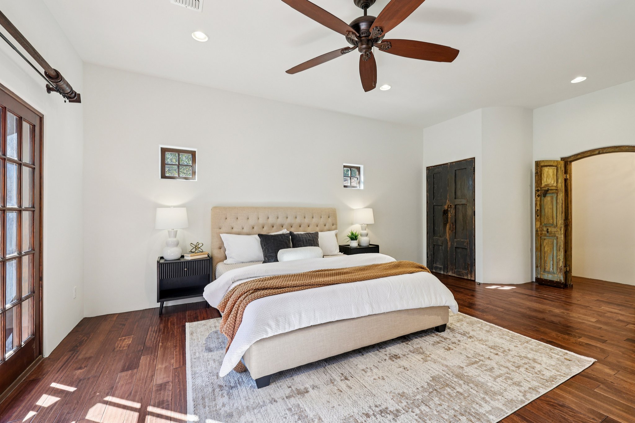2706 Pearce Road Austin, TX 78730 - Photo 24 of 37 a bedroom with a bed and a walk in closet