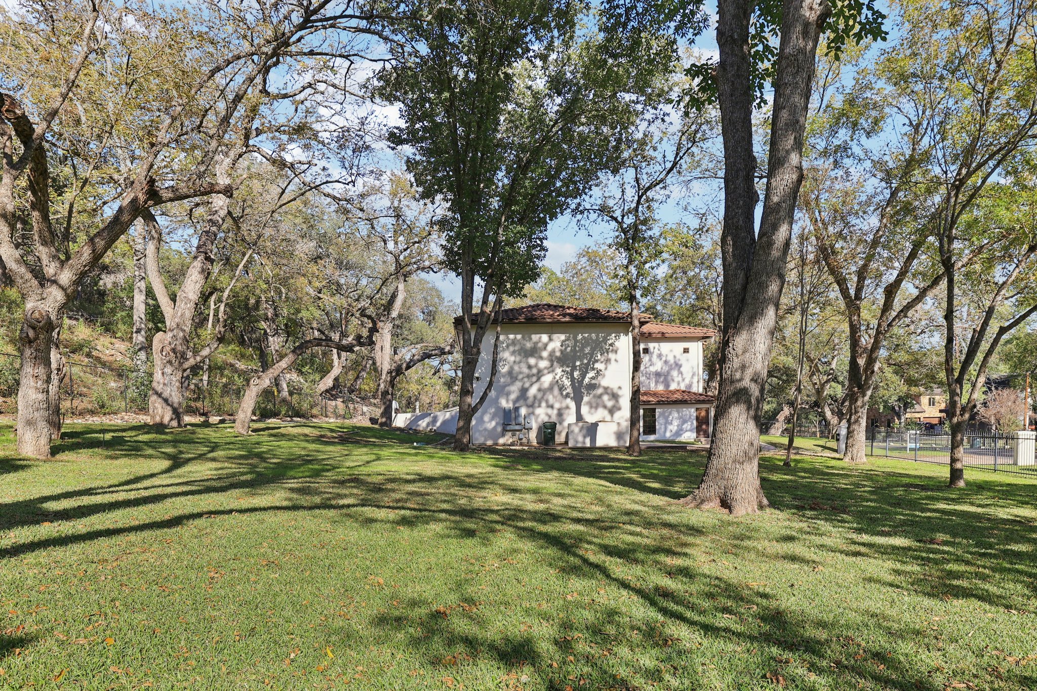 2706 Pearce Road Austin, TX 78730 - Photo 10 of 37 a view of a park with large trees