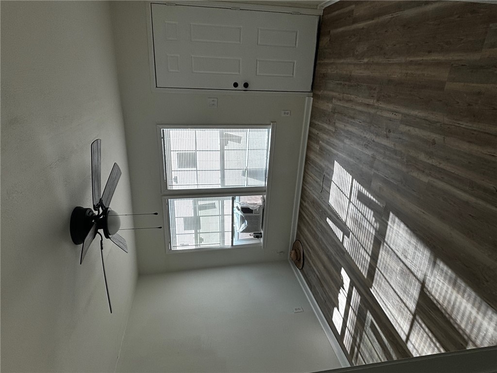 408 Hill Street Bryan, TX 77803 - Photo 2 of 13 a view of an empty room and window
