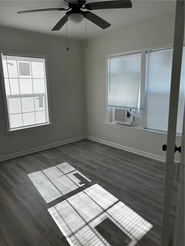 a view of an empty room and window