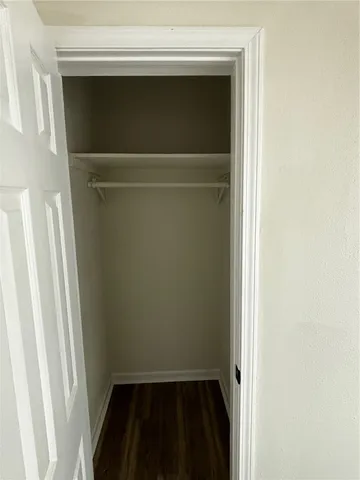 a view of a bathroom from a door