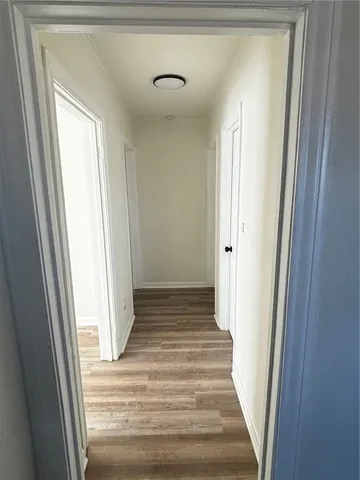 a bathroom with a sink toilet and a mirror