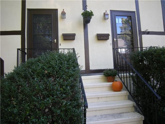 413 Glenbrook Road, Unit 7 Stamford, CT 06906 - Photo 1 of 1 a view of front door and potted plants