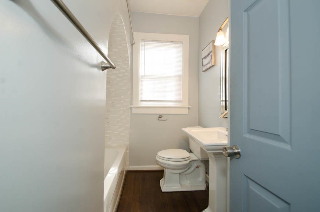 4572 Princeton Road Memphis, TN 38117 - Photo 13 of 24 Bathroom with dark wood-style flooring and shower / tub combination