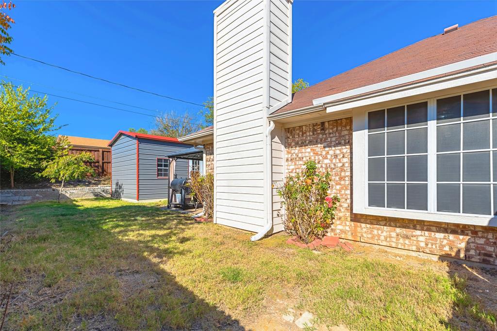 6501 Patsy Lane Watauga, TX 76148 - Photo 24 of 24 a view of a house with backyard and garden
