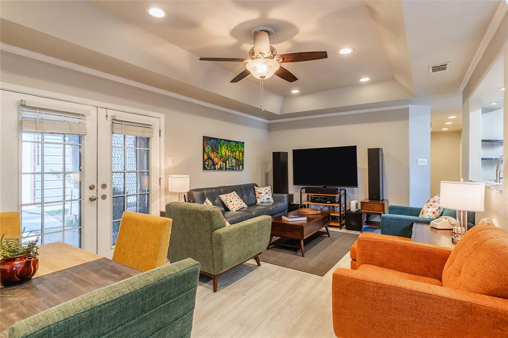 6501 Patsy Lane Watauga, TX 76148 - Photo 8 of 24 a living room with furniture and a flat screen tv