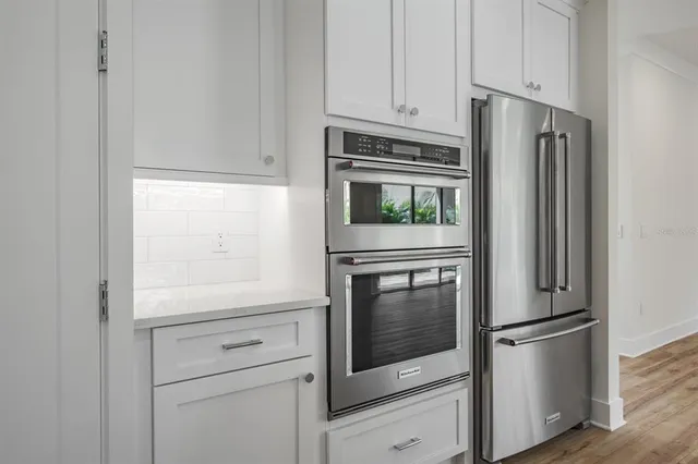 a kitchen with a sink and window