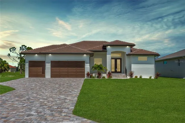 front view of a house with a yard