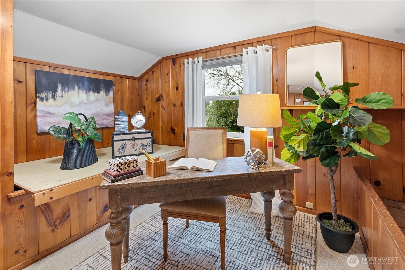 15760 Meridian Avenue North Shoreline, WA 98133 - Photo 17 of 26 a workstation with a desk chair and a couch with wooden floor