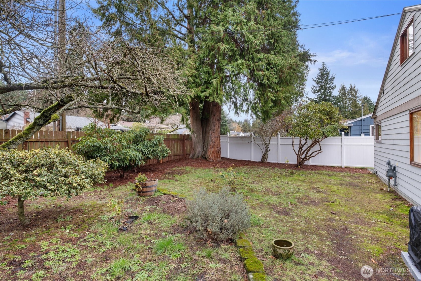 15760 Meridian Avenue North Shoreline, WA 98133 - Photo 23 of 26 a backyard of a house with lots of green space