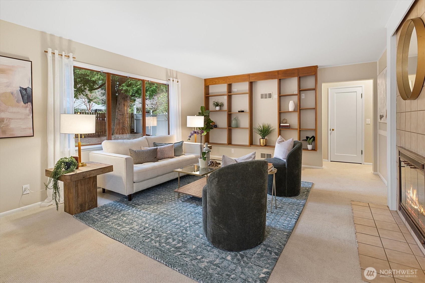 15760 Meridian Avenue North Shoreline, WA 98133 - Photo 8 of 26 a living room with furniture and a floor to ceiling window
