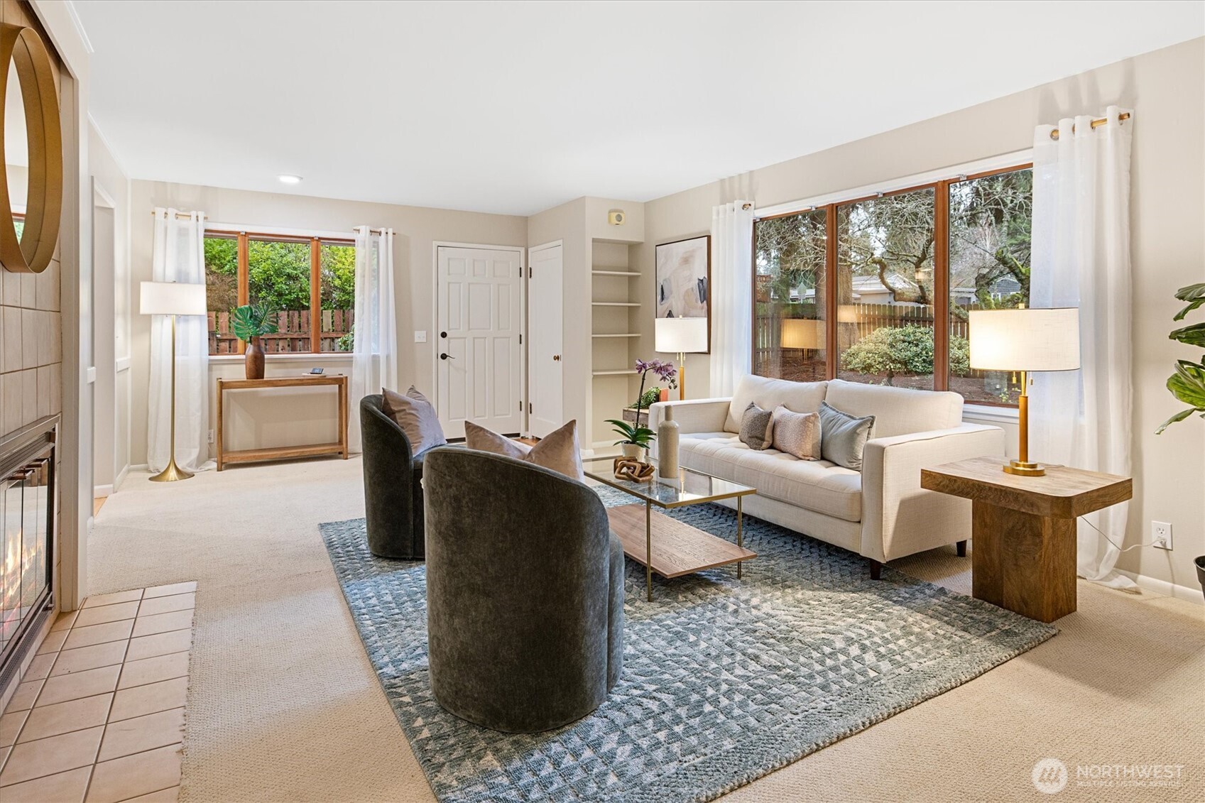 15760 Meridian Avenue North Shoreline, WA 98133 - Photo 9 of 26 a living room with furniture and large windows