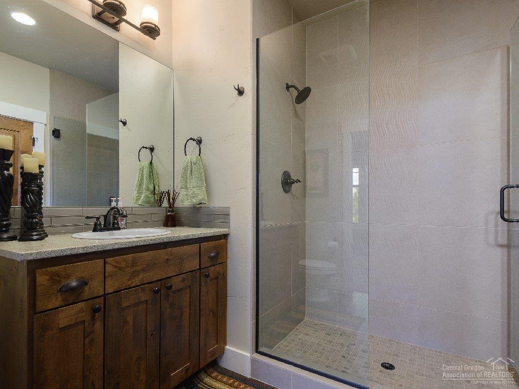 16464 Southwest Ranchview Road Powell Butte, OR 97753 - Photo 8 of 24 Tiled Shower, Counter Tops and Floors