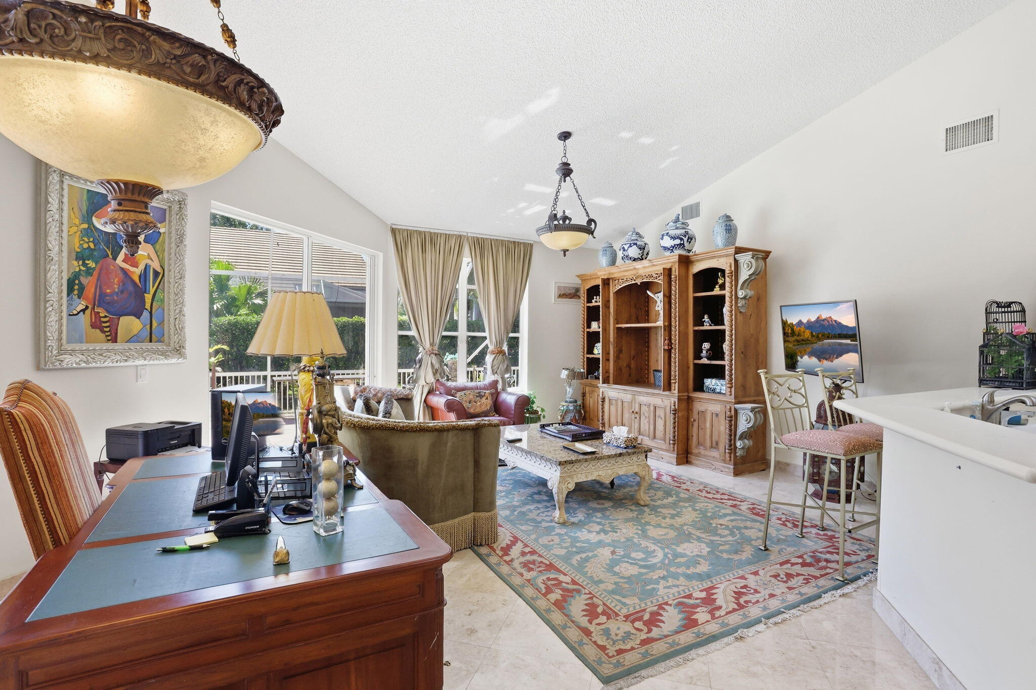 7821 Dorchester Road Boynton Beach, FL 33472 - Photo 12 of 49 a living room with furniture and wooden floor