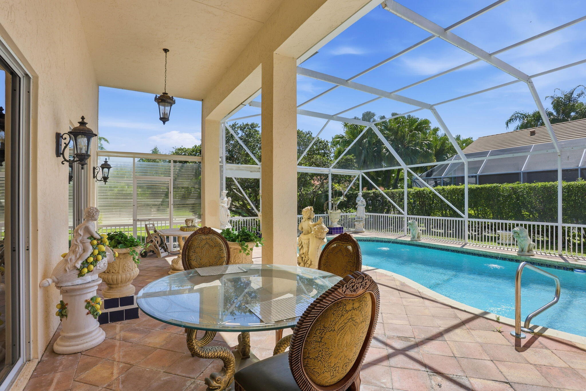 7821 Dorchester Road Boynton Beach, FL 33472 - Photo 21 of 49 a living room with furniture and a potted plant