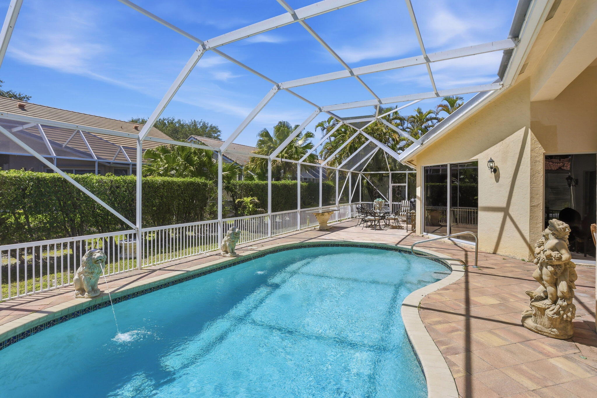 7821 Dorchester Road Boynton Beach, FL 33472 - Photo 25 of 49 a view of a backyard with porch area
