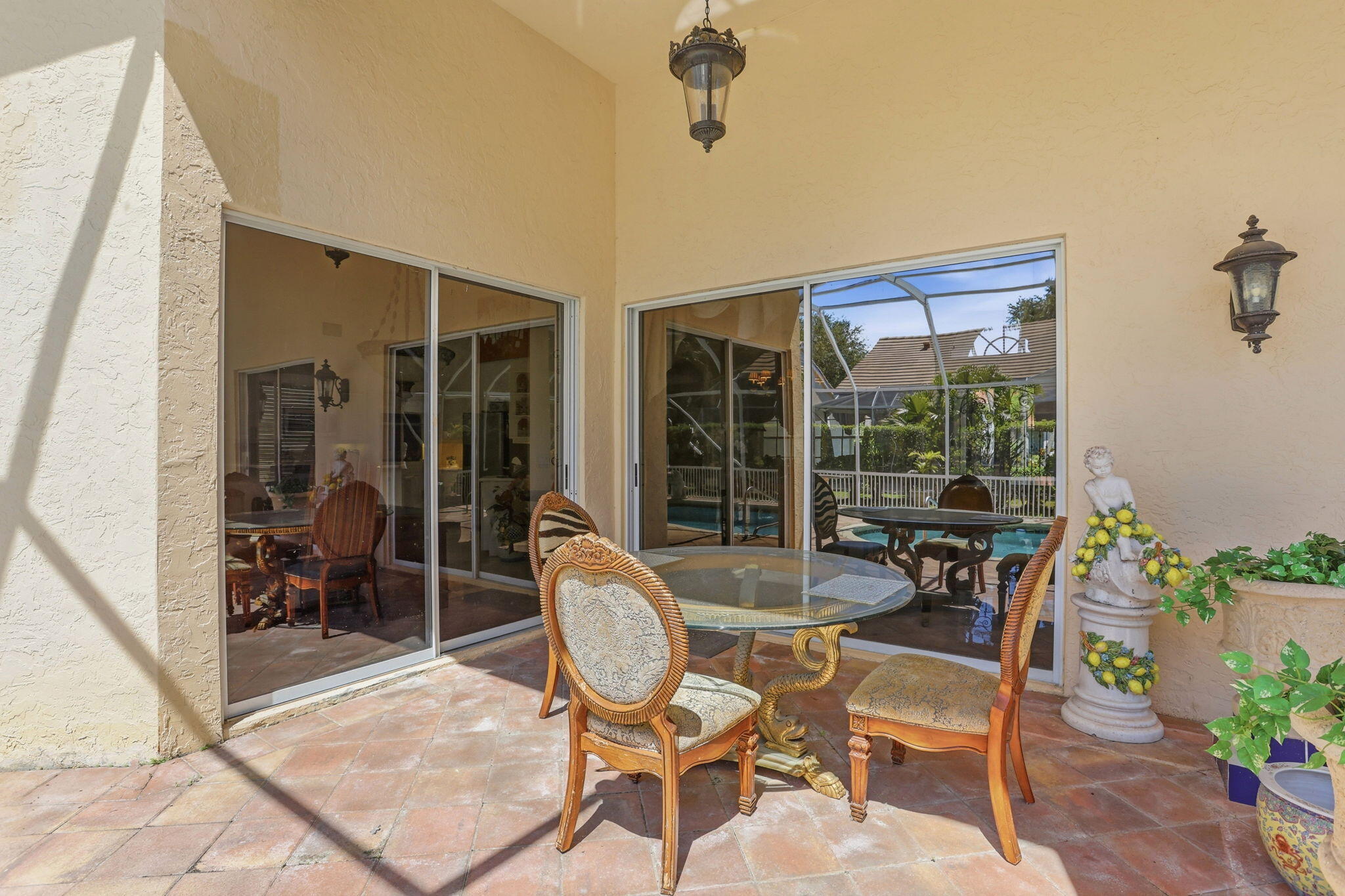 7821 Dorchester Road Boynton Beach, FL 33472 - Photo 27 of 49 a dining room with furniture and front door