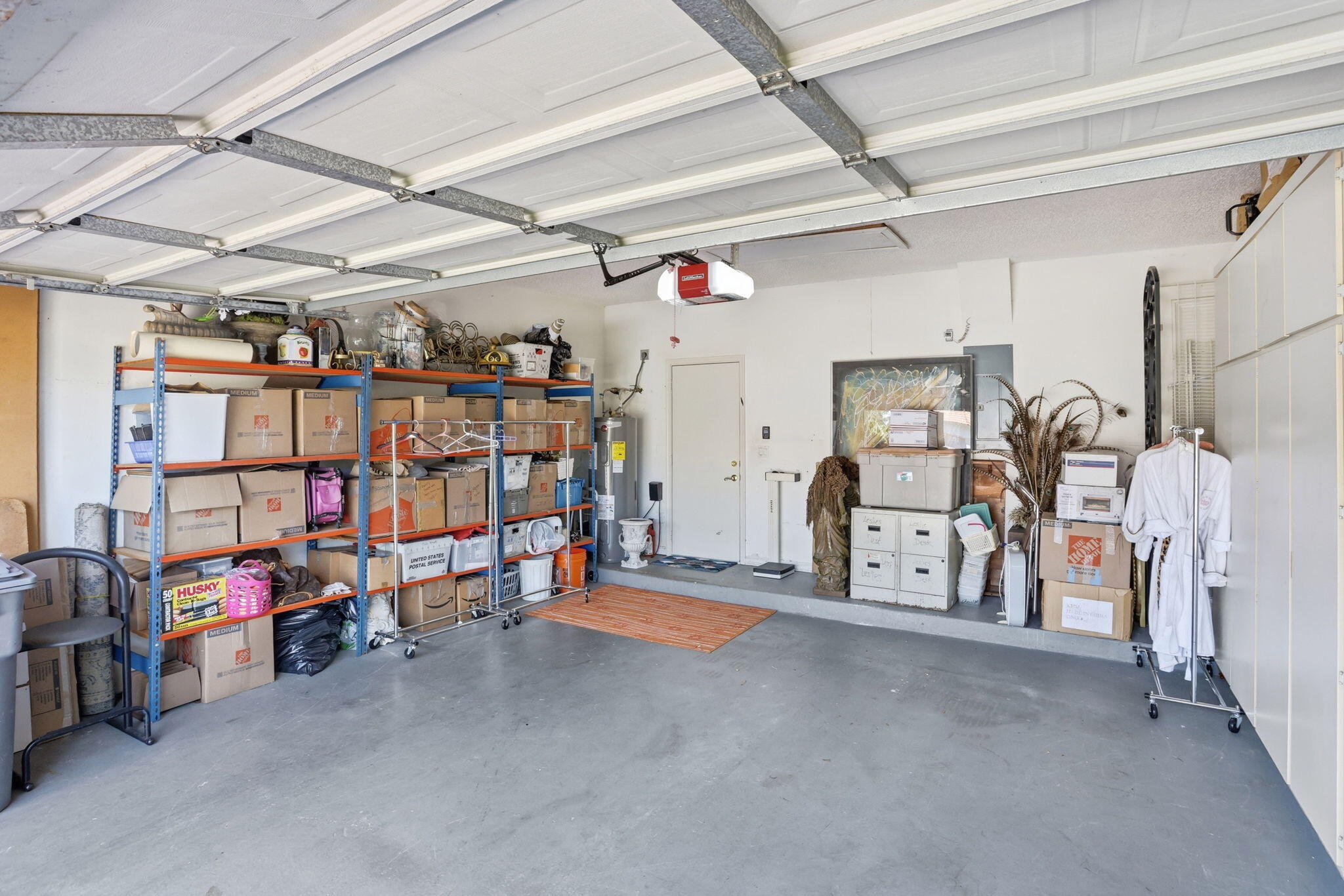 7821 Dorchester Road Boynton Beach, FL 33472 - Photo 33 of 49 a view of a storage room with a lot of stuff