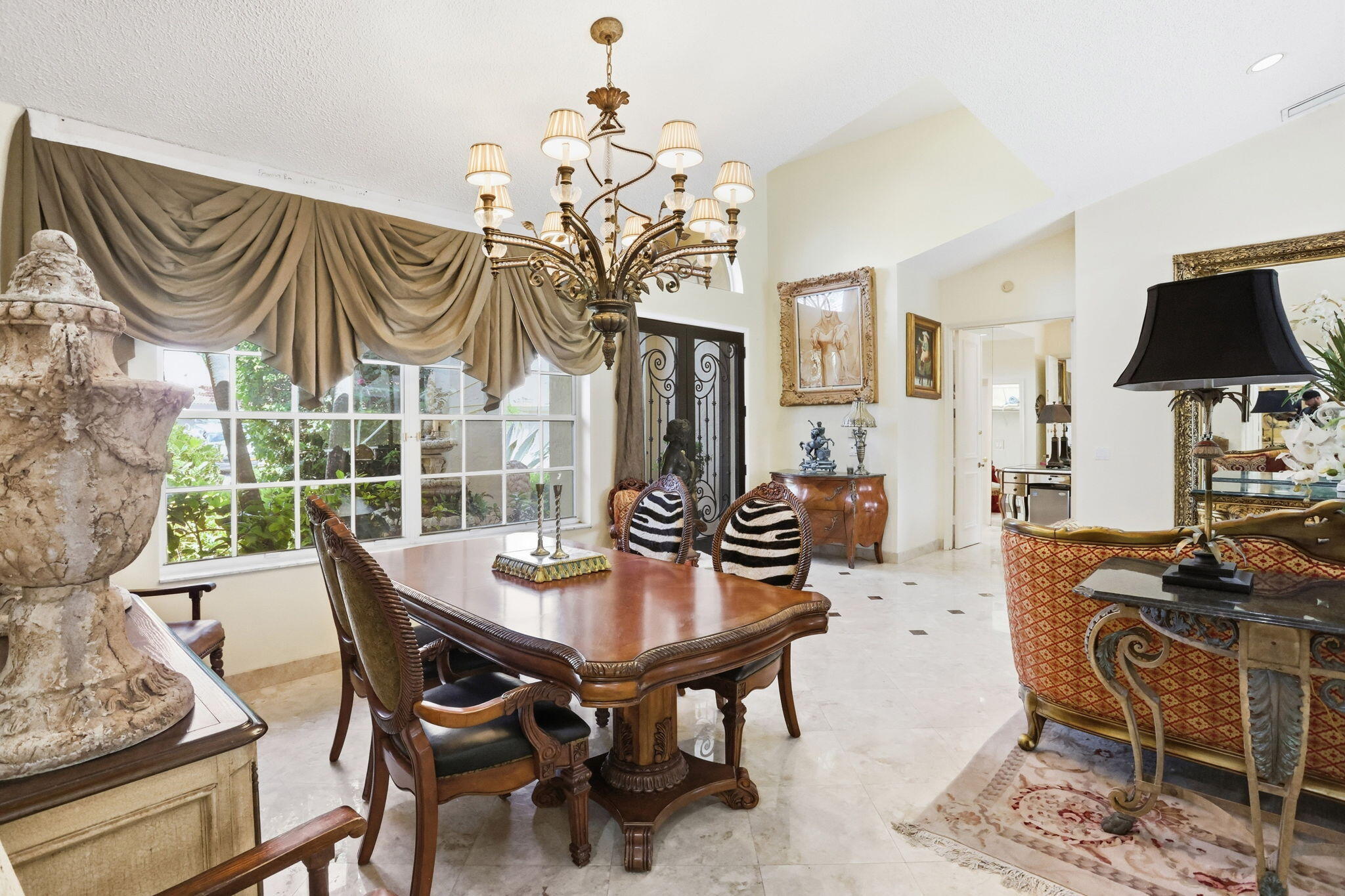 7821 Dorchester Road Boynton Beach, FL 33472 - Photo 8 of 49 a view of a dining room with furniture window and wooden floor