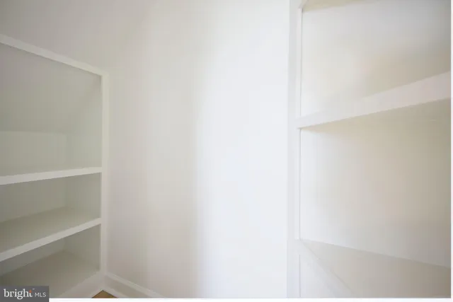 a view of small space with racks on the wall