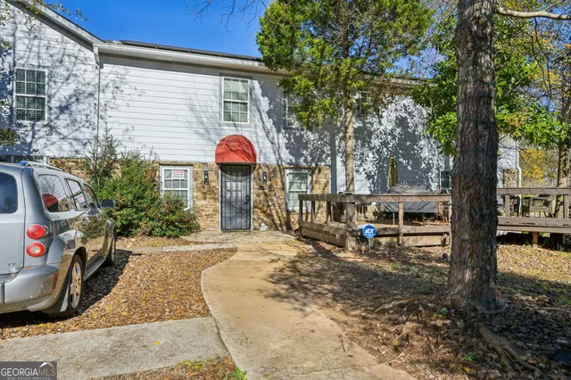 a view of a house with a patio