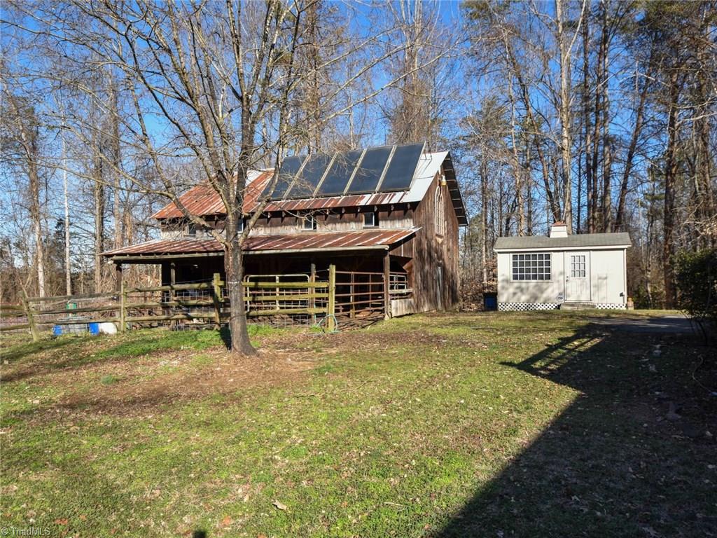 8025 Peak Road Clemmons, NC 27012 - Photo 3 of 29 Barn has electric and large loft. Shed has electric, heat and air, and can be used an office.