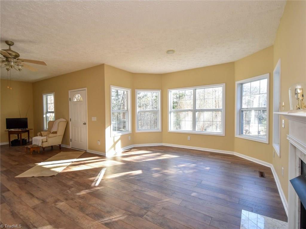 8025 Peak Road Clemmons, NC 27012 - Photo 8 of 29 Freshly painted and new floors through out! Move in ready!