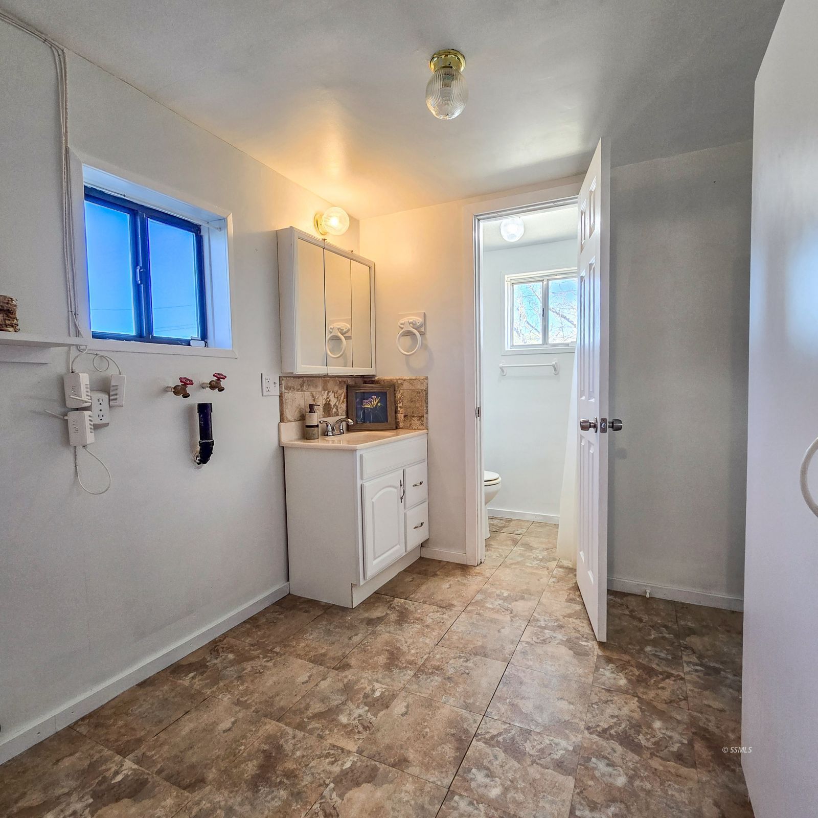 1436 Mayo Street Ridgecrest, CA 93555 - Photo 22 of 29 a view of a kitchen with a sink