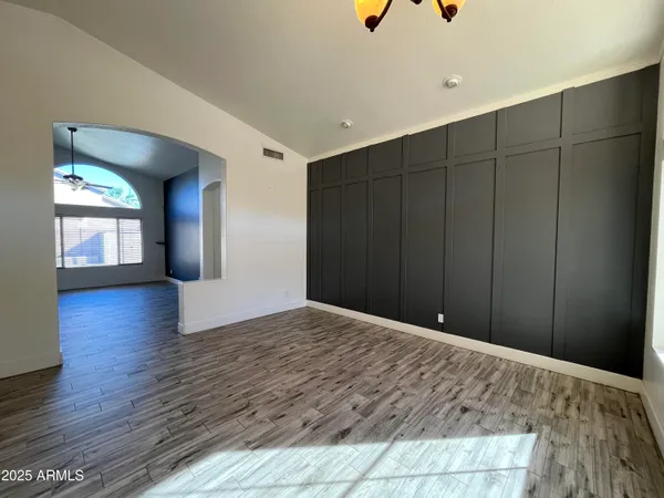 a view of a livingroom with wooden floor