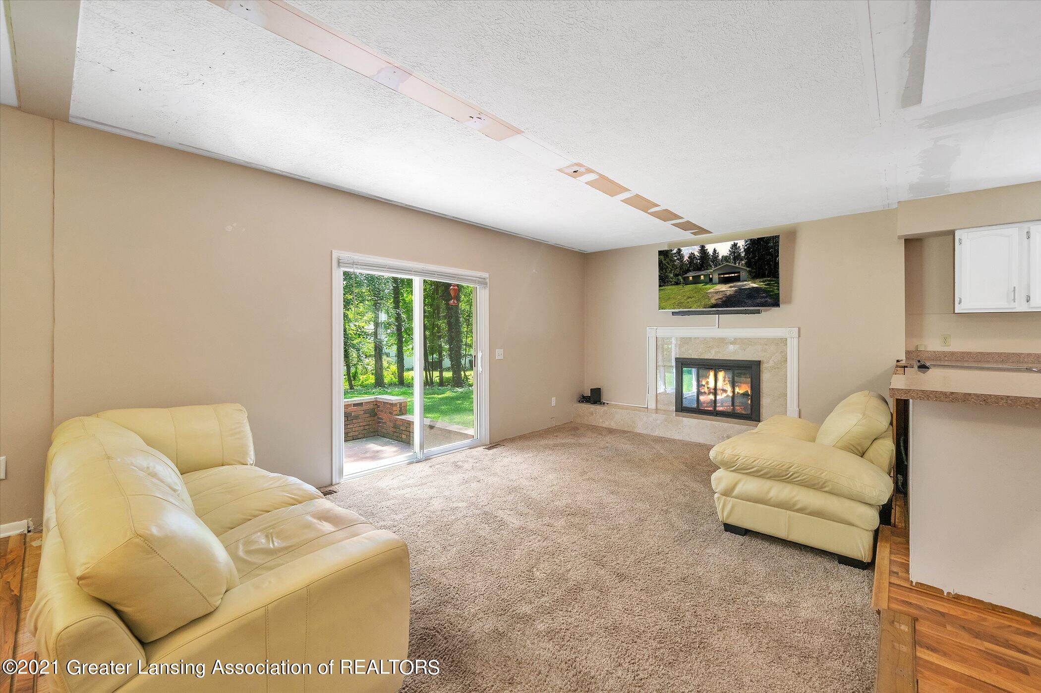12159 Pine Ridge Drive Perry, MI 48872 - Photo 8 of 40 08-12159-Pine-Ridge-Dr-WindowStill-Real-