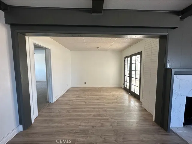 a view of an empty room and window