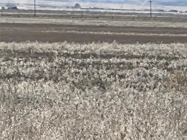 a view of a town with mountains