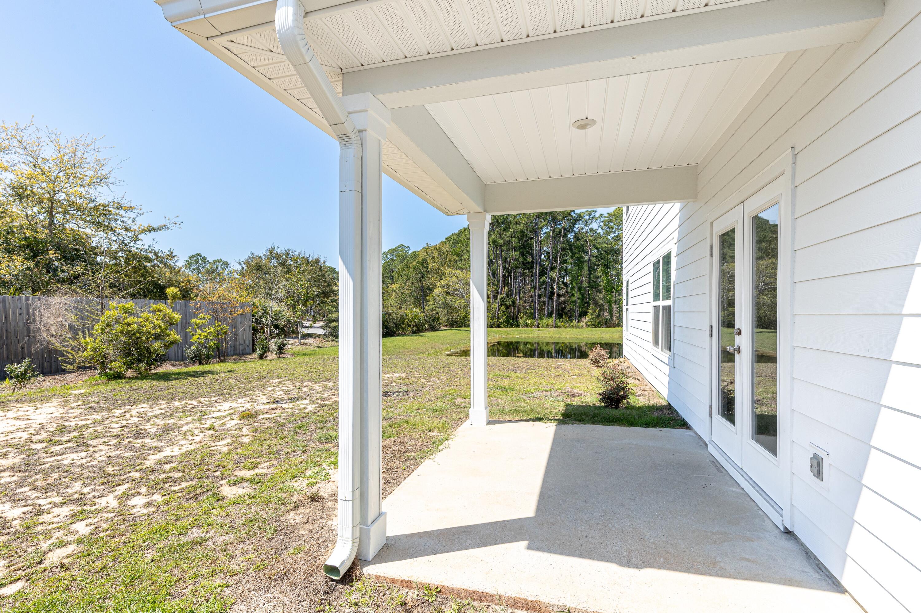 116 Sea Eagle Lane, Unit LOT 4 Santa Rosa Beach, FL 32459 - Photo 7 of 42 Back Covered Porch