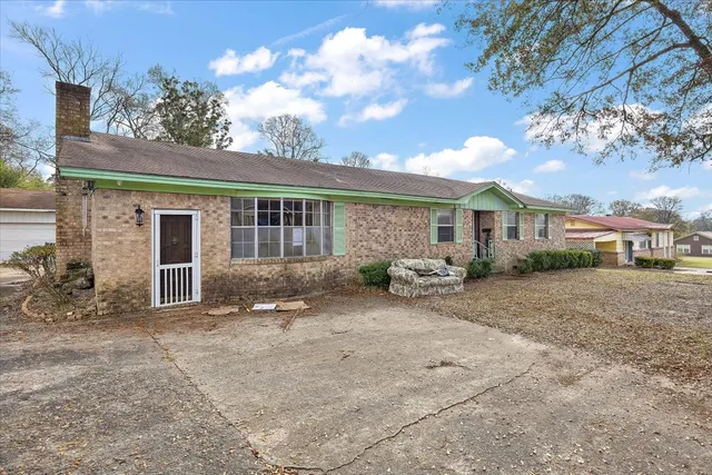 a view of a house with a patio