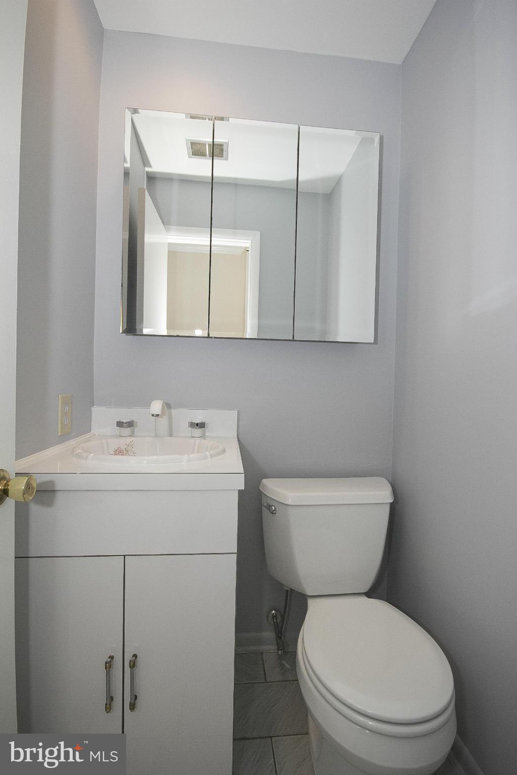 7201 Denberg Road Baltimore, MD 21209 - Photo 6 of 30 Powder Room Main Floor