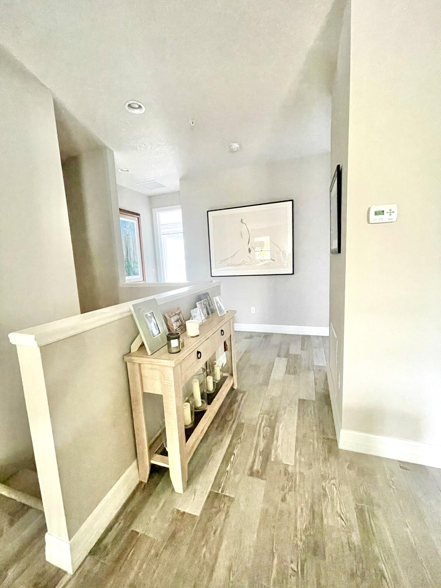 1127 Dakota Drive Jupiter, FL 33458 - Photo 6 of 25 Hall to Bedrooms