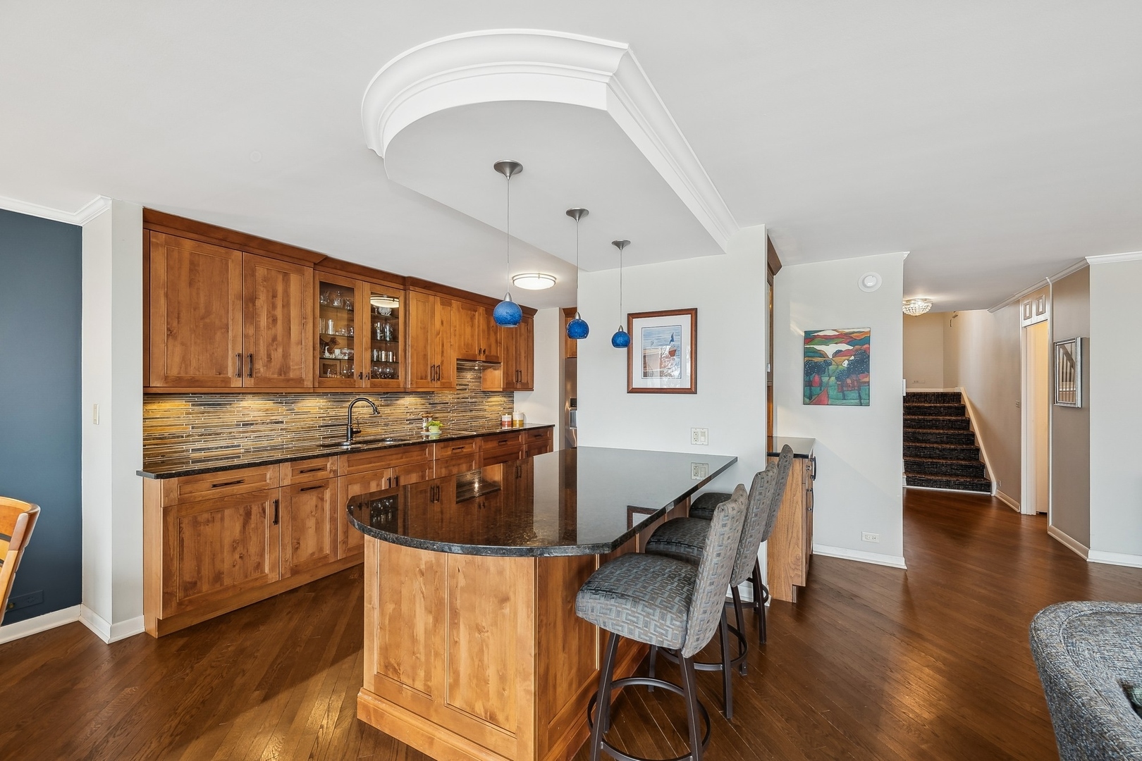 1630 Sheridan Road, Unit 4M Wilmette, IL 60091 - Photo 15 of 39 a kitchen with stainless steel appliances granite countertop a stove and a refrigerator