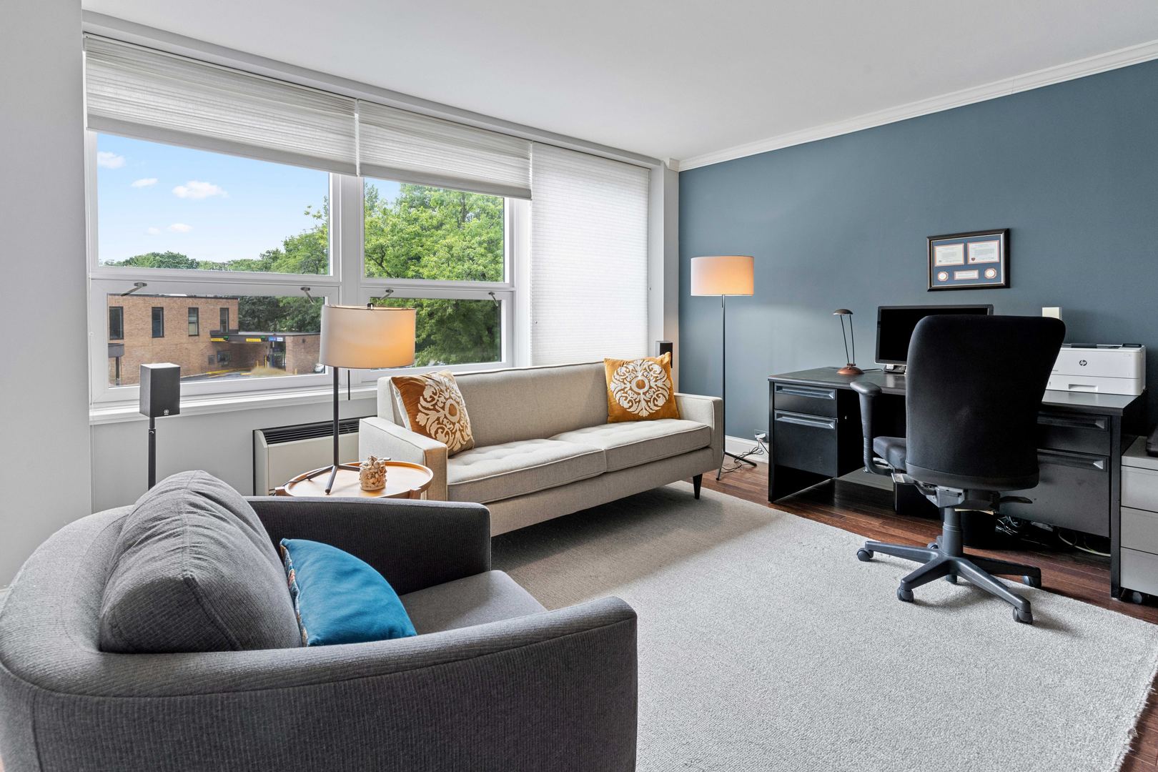 1630 Sheridan Road, Unit 4M Wilmette, IL 60091 - Photo 25 of 39 a living room with furniture and a large window