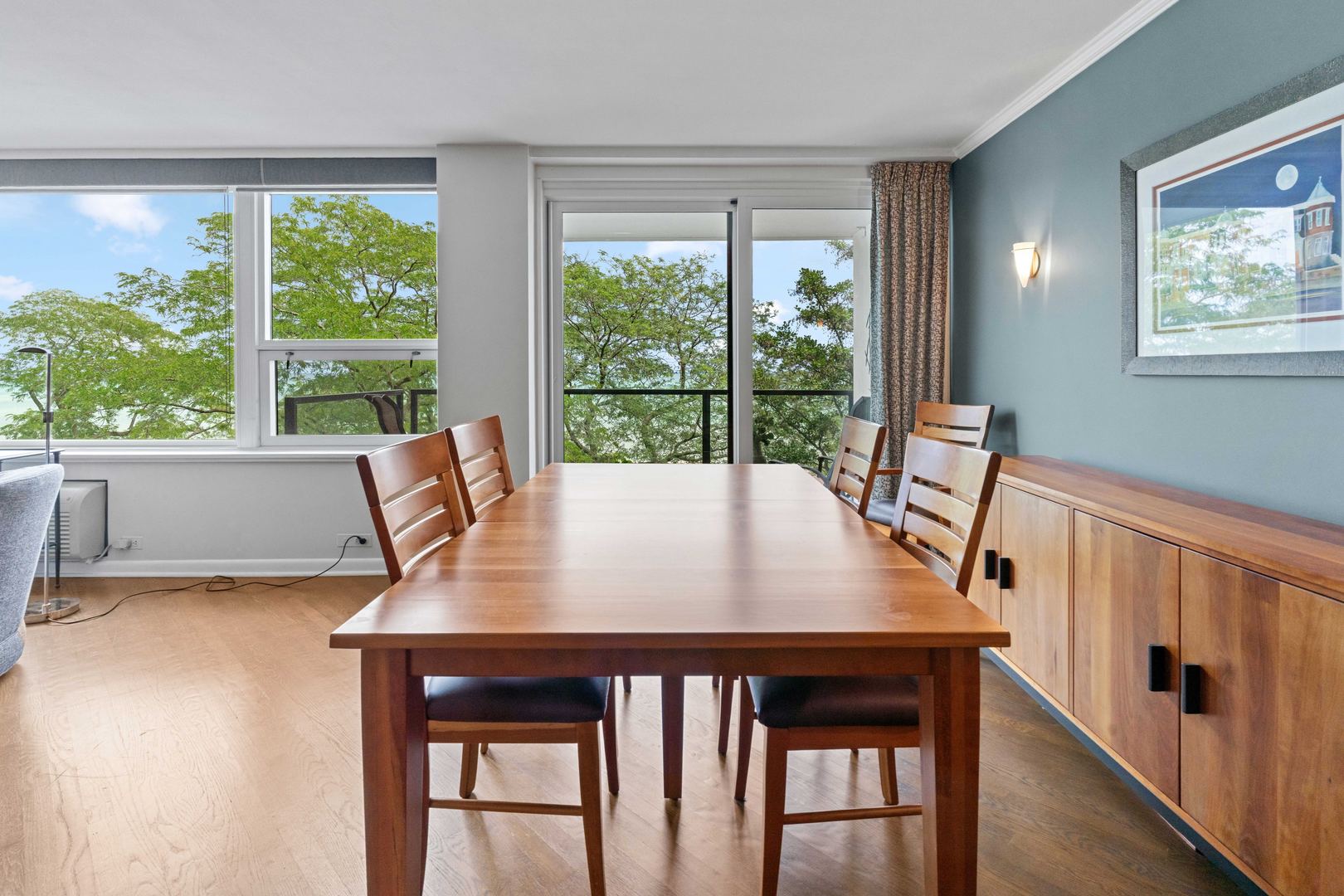 1630 Sheridan Road, Unit 4M Wilmette, IL 60091 - Photo 7 of 39 a view of a dining room with furniture window and outside view
