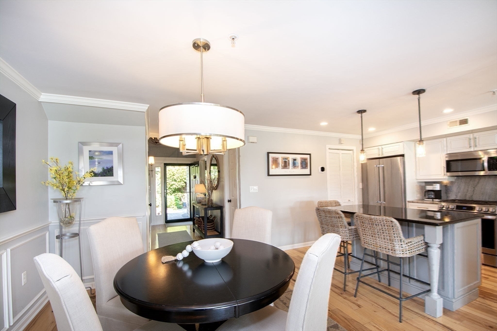 16 Ladds Way, Unit 16 Scituate, MA 02066 - Photo 13 of 40 a view of a dining room with furniture