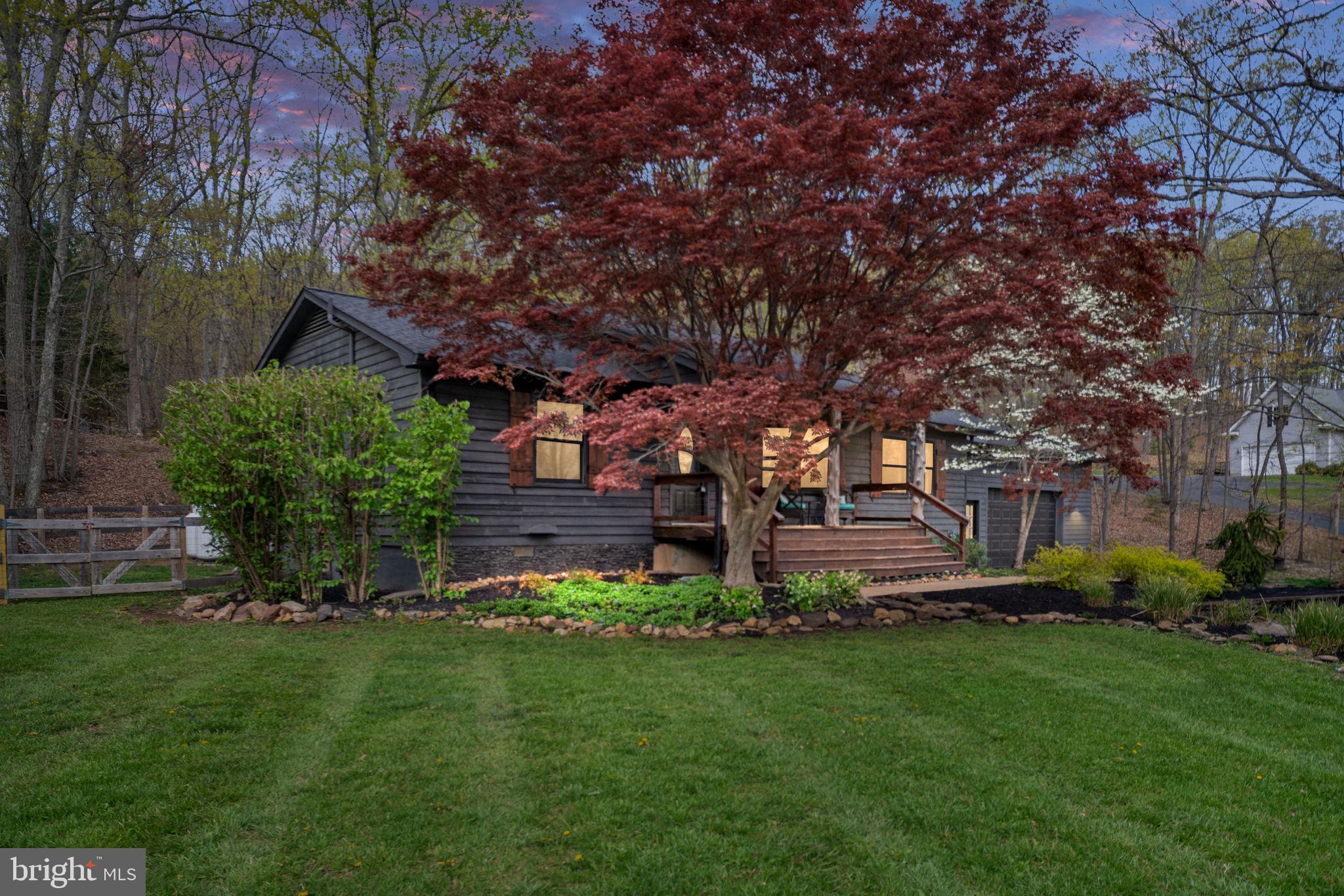 4098 Mountain Road Haymarket, VA 20169 - Photo 3 of 49 a garden view with a seating space