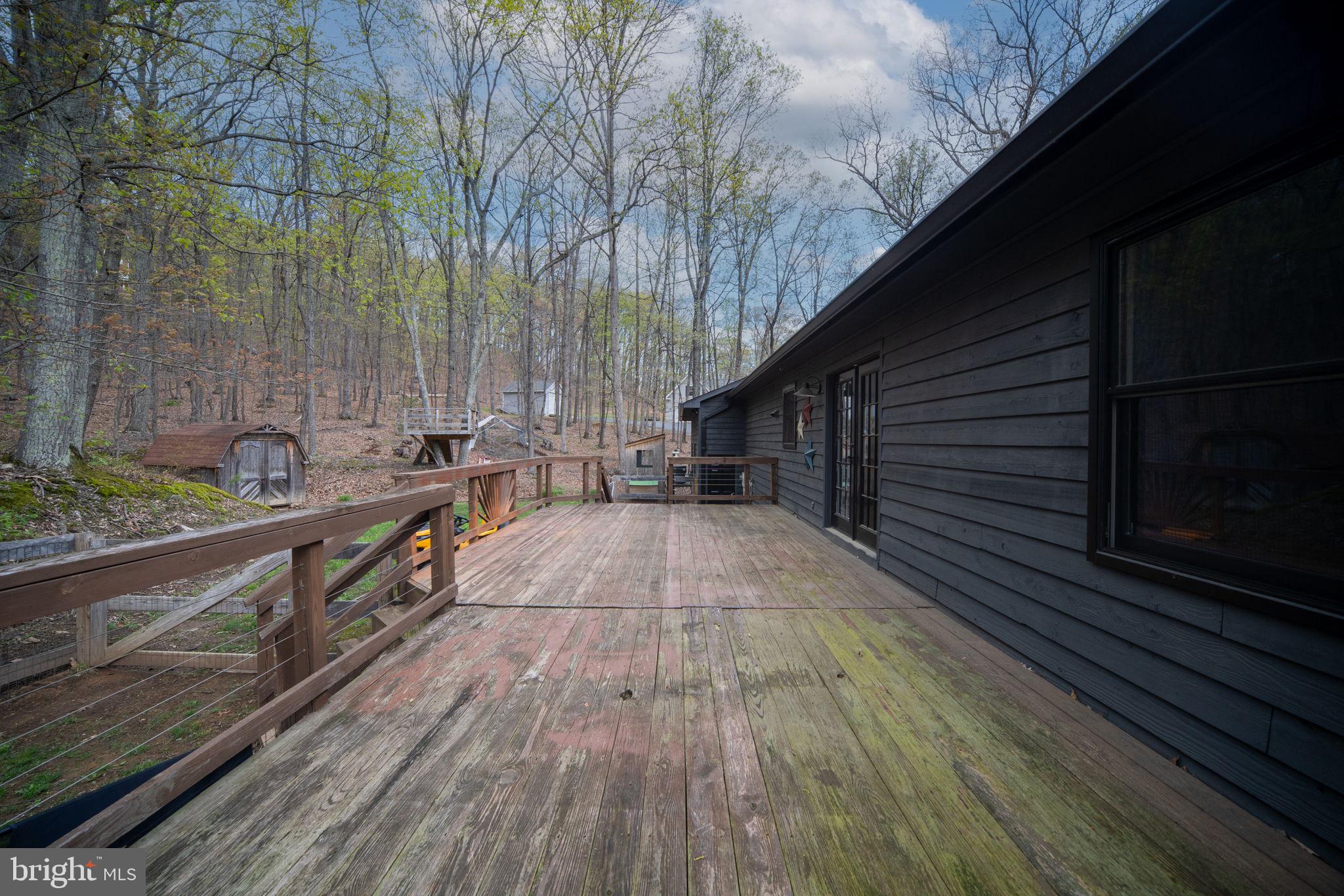 4098 Mountain Road Haymarket, VA 20169 - Photo 37 of 49 a view of balcony with wooden floor and outdoor space