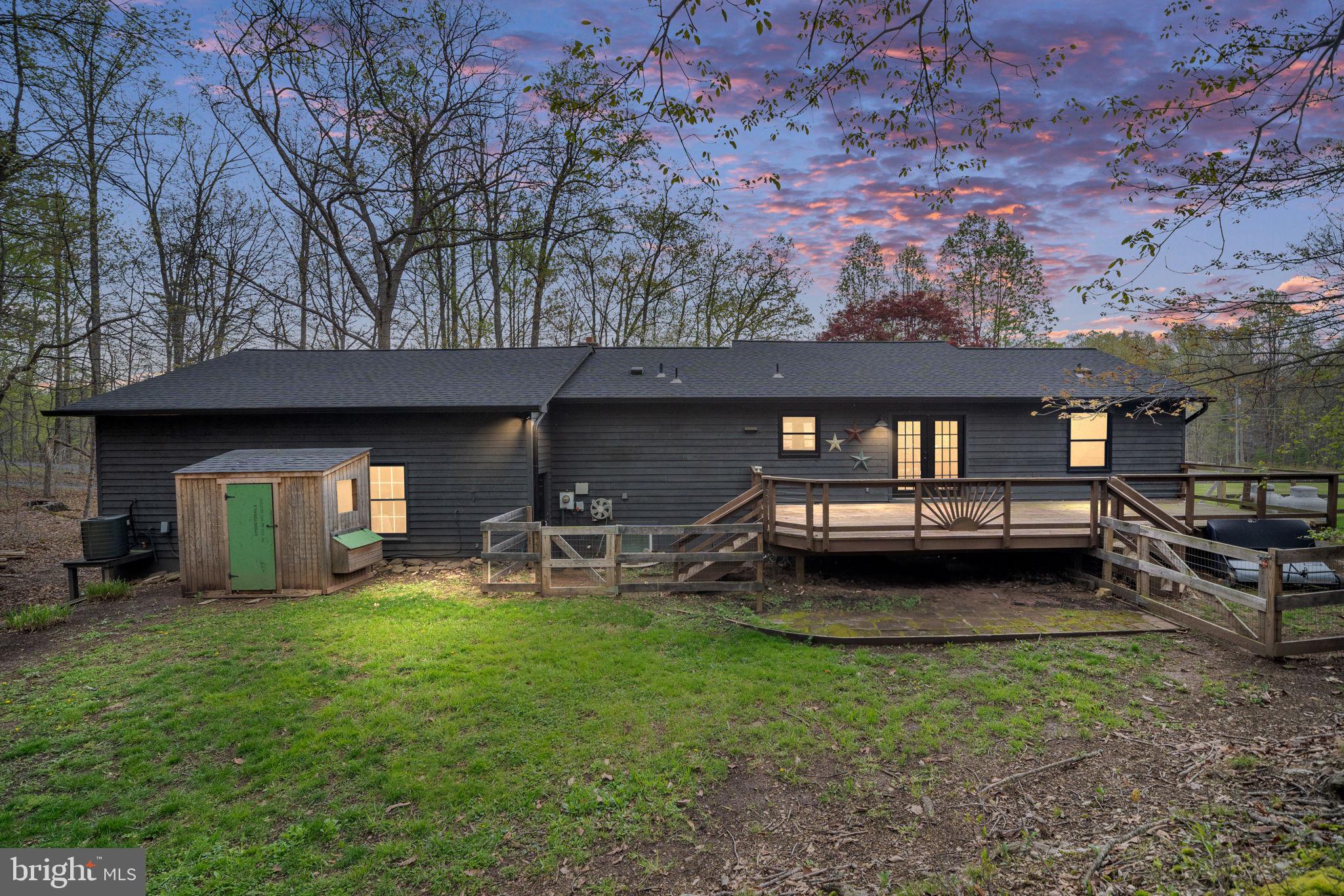 4098 Mountain Road Haymarket, VA 20169 - Photo 40 of 49 a view of a house with backyard and sitting area