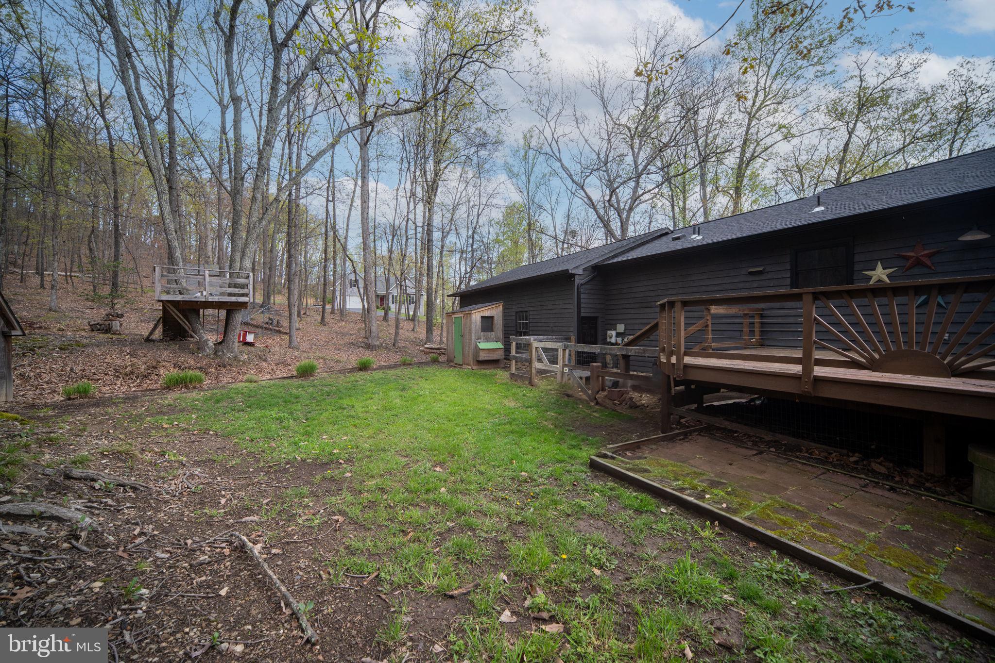 4098 Mountain Road Haymarket, VA 20169 - Photo 42 of 49 a view of a backyard with sitting area