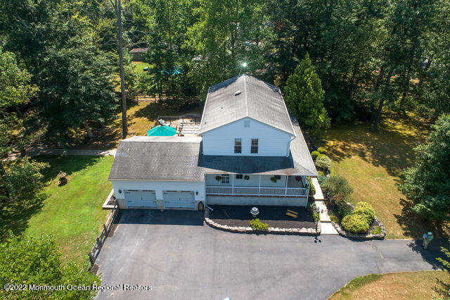340 East Millstream Road Cream Ridge, NJ 08514 - Photo 14 of 40 an aerial view of a house with wooden fence