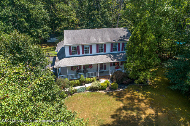 340 East Millstream Road Cream Ridge, NJ 08514 - Photo 34 of 40 an aerial view of a house with a yard and sitting area