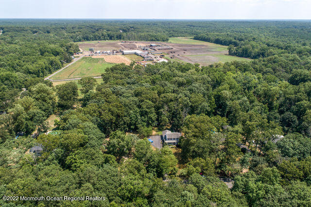 340 East Millstream Road Cream Ridge, NJ 08514 - Photo 5 of 40 an aerial view of a house with outdoor space and garden