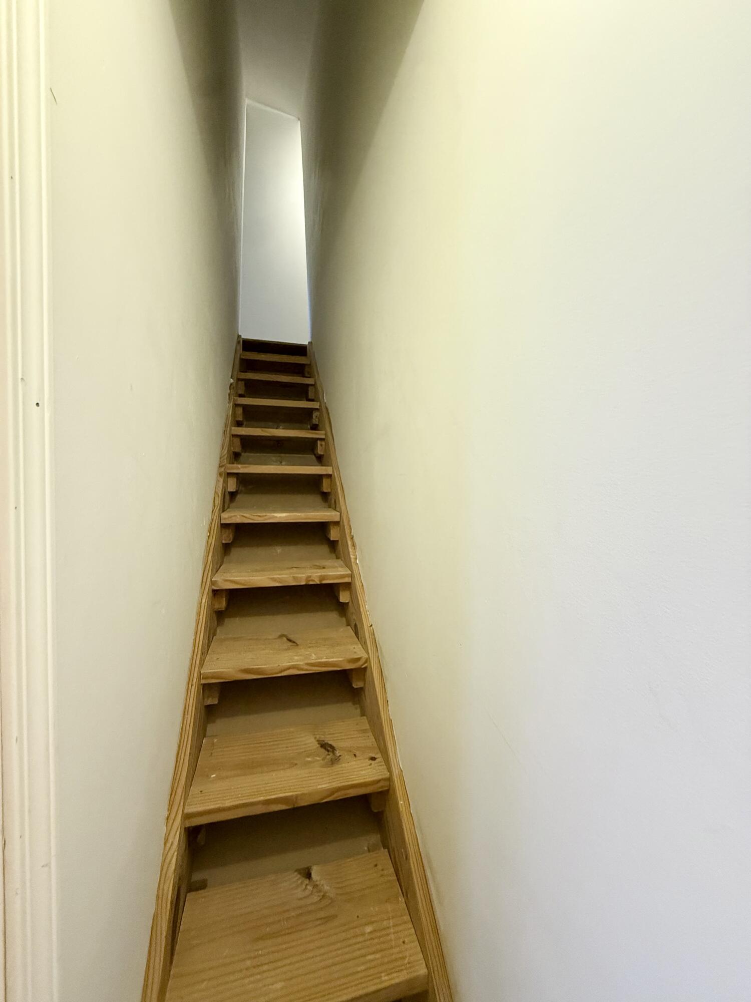 340 Hunters Paradise Road Monticello, KY 42633 - Photo 44 of 59 Stairs to secret room in attic.